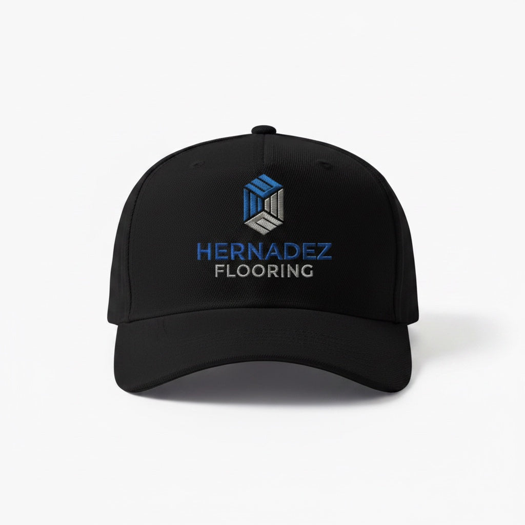 Label Stitch Studio black adjustable baseball cap featuring custom embroidered Hernadez Flooring logo on the front