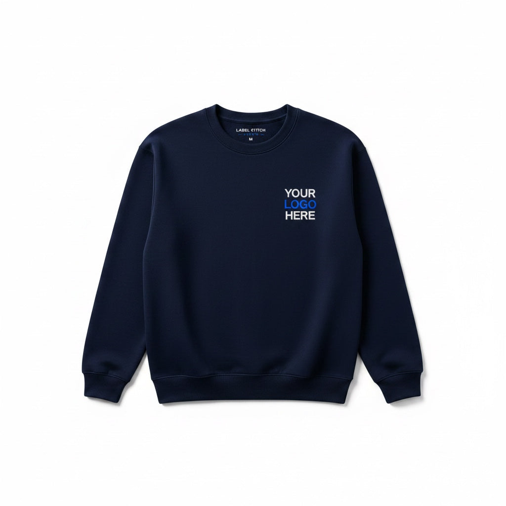 Label Stitch Studio navy crewneck sweatshirt with custom embroidery on the chest, featuring ribbed cuffs and hem.